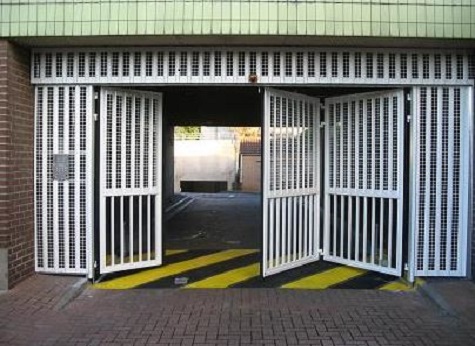 Security gates for garage and warehouse doors 